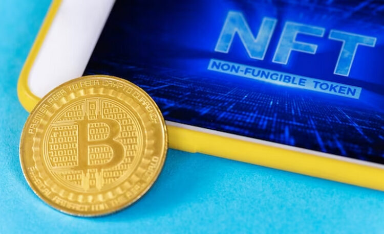 Bitcoin resting on a tablet showing NFT