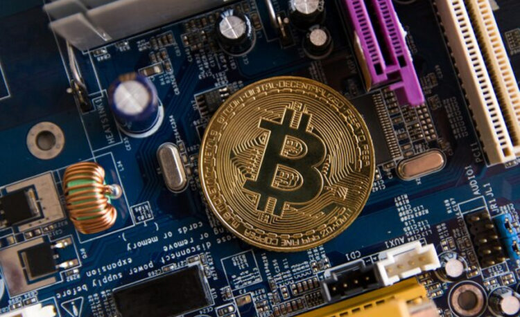 bitcoin coins on motherboard